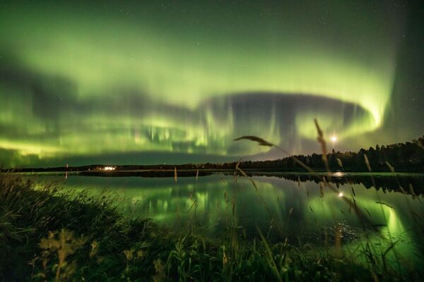 Ánh cực quang phương Bắc trên bầu trời Rovaniemi, Phần Lan - Sputnik Việt Nam
