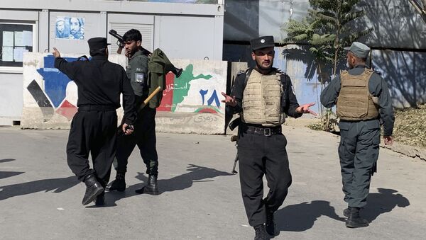 Cảnh sát Afghanistan tại hiện trường vụ tấn công trường đại học ở Kabul. - Sputnik Việt Nam