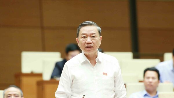 Đại tướng Tô Lâm, Bộ trưởng Bộ Công an trả lời chất vấn của đại biểu Quốc hội. - Sputnik Việt Nam