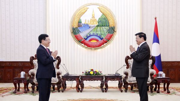 Thủ tướng Lào Thongloun Sisoulith tiếp Phó Thủ tướng, Bộ trưởng Ngoại giao Phạm Bình Minh. - Sputnik Việt Nam