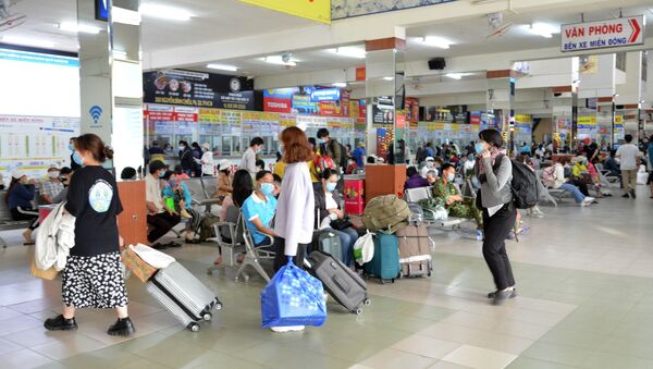Người dân rời Thành phố Hồ Chí Minh bắt đầu kỳ nghỉ Tết Dương lịch. - Sputnik Việt Nam