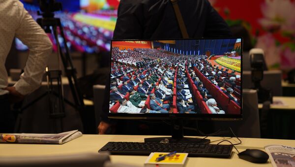 Phát Sóng Trực Tiếp Đại hội Đảng Cộng sản Việt Nam XIII trên màn hình máy tính ở  Trung tâm báo chí - Sputnik Việt Nam