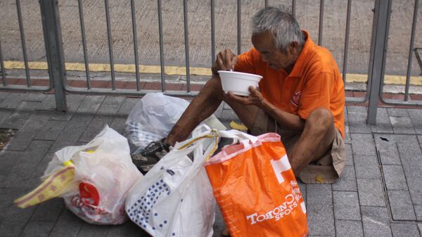 Một người đàn ông vô gia cư ở Hồng Kong - Sputnik Việt Nam