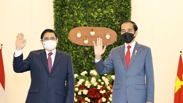 Thủ tướng Phạm Minh Chính và Tổng thống Indonesia Joko Widodo. - Sputnik Việt Nam