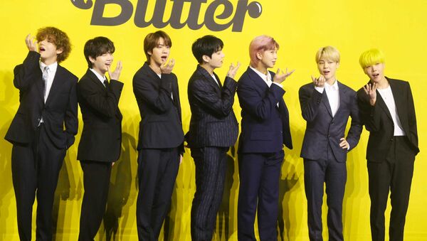 Các thành viên ban nhạc Hàn Quốc BTS trong buổi họp báo ra mắt MV mới “Butter”. - Sputnik Việt Nam