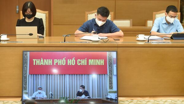 Điểm cầu trực tuyến từ Thành phố Hồ Chí Minh tại cuộc họp với Phó Thủ tướng Vũ Đức Đam - Sputnik Việt Nam