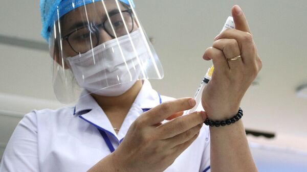 Phó Thủ tướng thường trực Trương Hòa Bình khởi động chiến dịch tiêm vaccine phòng COVID-19 tại Tp. Hồ Chí Minh - Sputnik Việt Nam