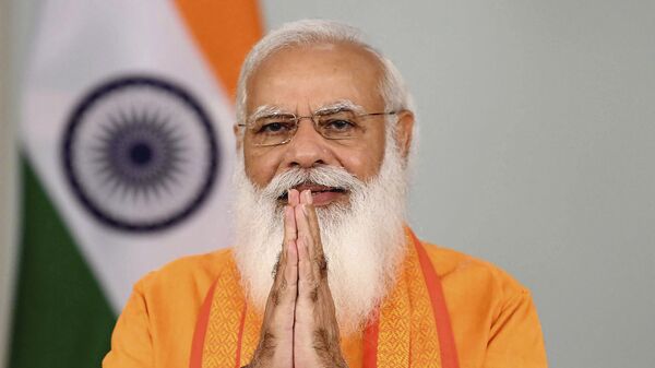 Thủ tướng Ấn Độ Narendra Modi phát biểu tại hội nghị truyền hình trong khuôn khổ chương trình Ngày Quốc tế Yoga ở New Delhi - Sputnik Việt Nam