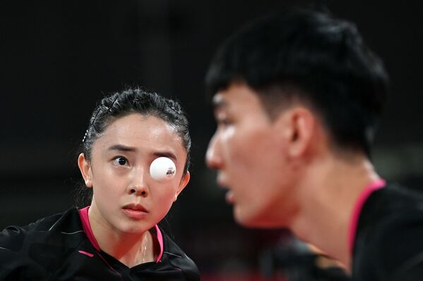 Hai VĐV Hàn Quốc Lee Sang-su và Jeon Ji-hee cạnh tranh với Lin Yun-ju và Cheng I-ching từ Nam Đài Loan trong Thế vận hội 2020 - Sputnik Việt Nam