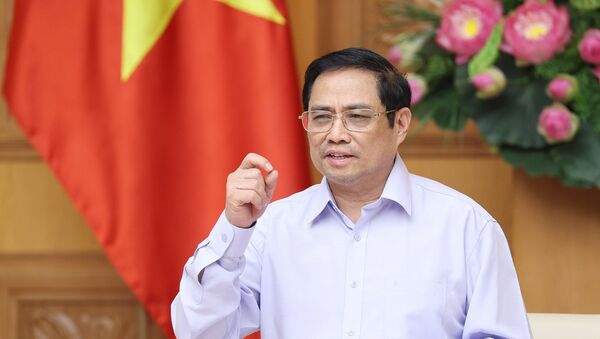 Thủ tướng Phạm Minh Chính phát biểu tại Hội nghị trực tuyến Chính phủ với doanh nghiệp, hiệp hội doanh nghiệp và các địa phương nhằm tìm giải pháp tháo gỡ khó khăn, thúc đẩy sản xuất kinh doanh trong bối cảnh dịch COVID-19 - Sputnik Việt Nam
