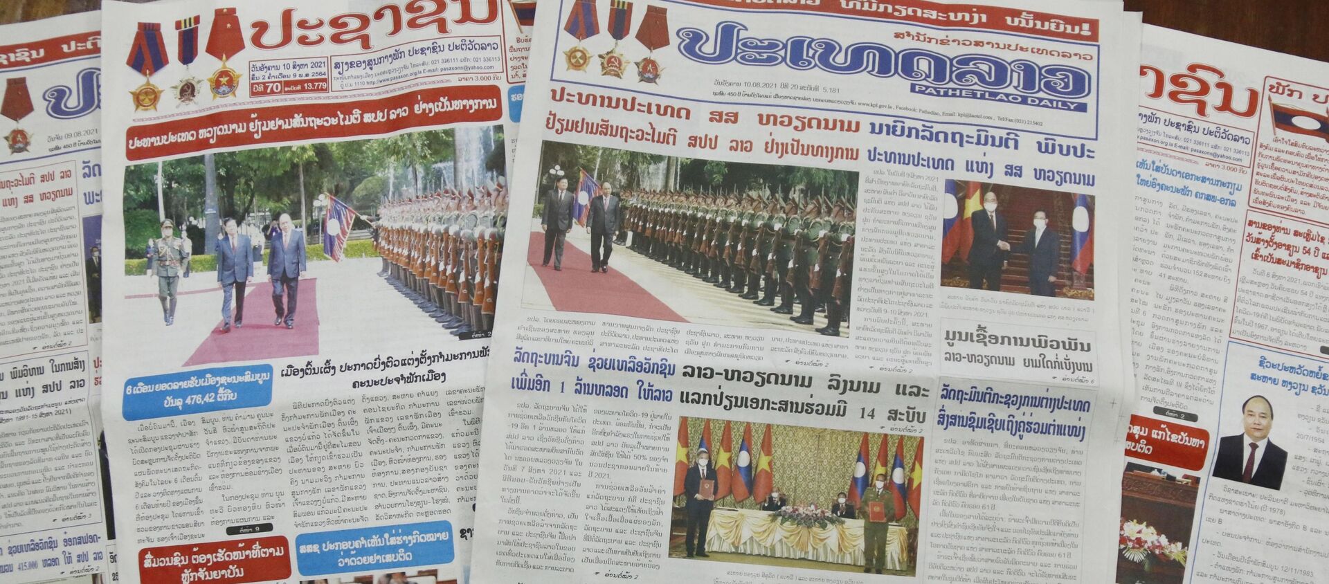 Báo chí Lào đưa tin đậm nét về chuyến thăm hữu nghị chính thức của Chủ tịch Nguyễn Xuân Phúc - Sputnik Việt Nam, 1920, 11.08.2021