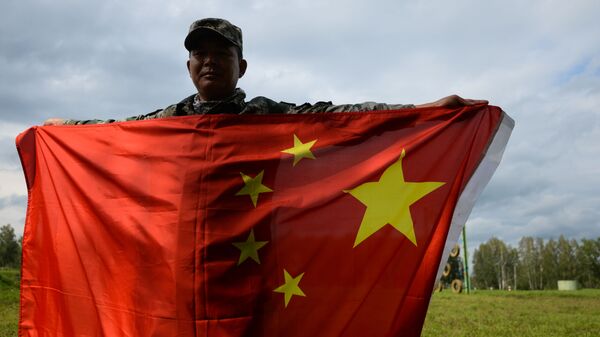 Một quân nhân của lực lượng vũ trang nước CHND Trung Hoa sau khi kết thúc chặng 1 Đổ bộ, hành quân của cuộc thi quốc tế Quân báo giỏi - Sputnik Việt Nam