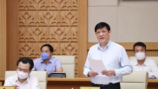 Bộ trưởng Bộ Y tế Nguyễn Thanh Long báo cáo kết quả phòng, chống dịch COVID-19. - Sputnik Việt Nam