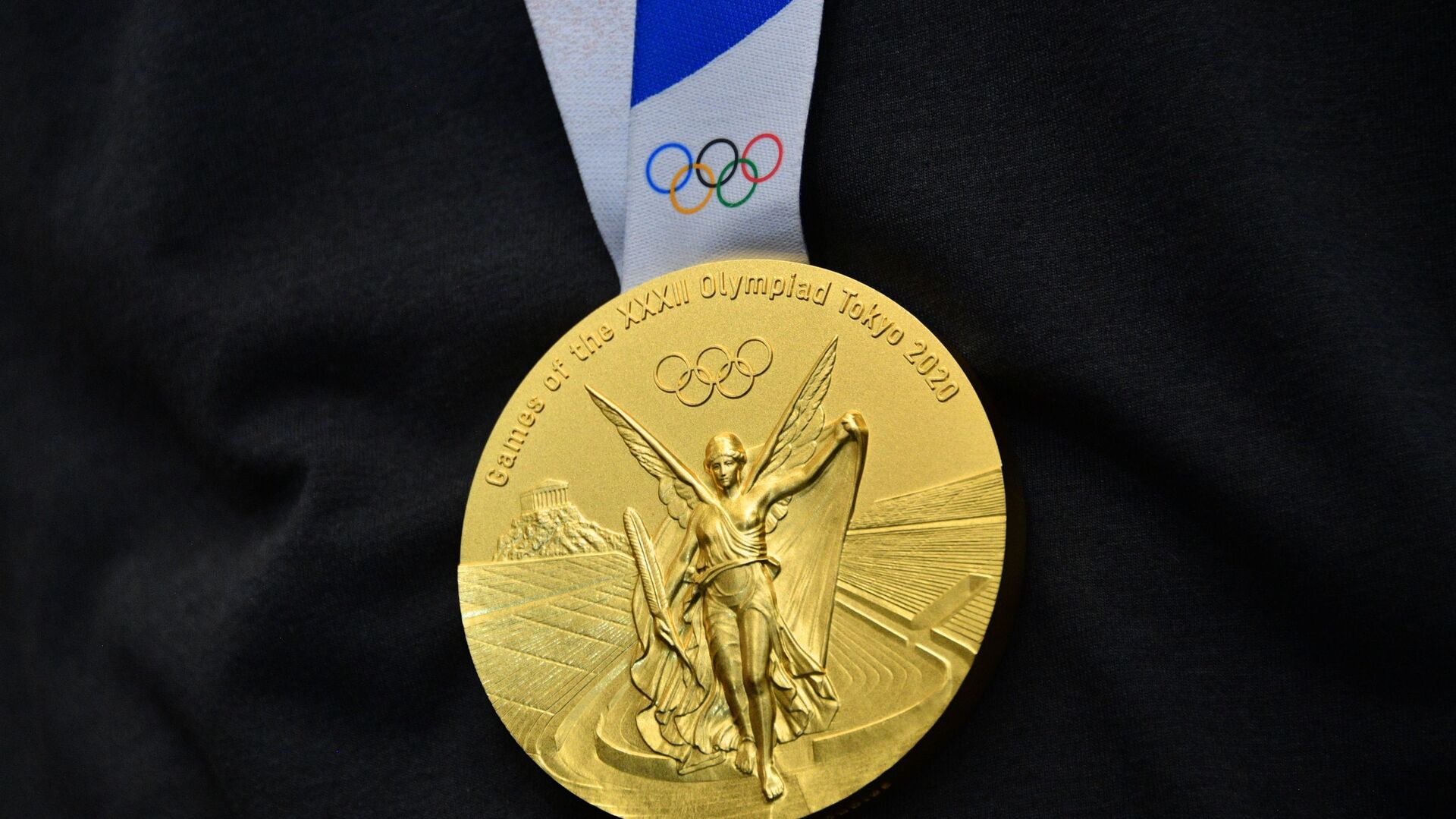 Huy chương vàng Thế vận hội Olympic tại Tokyo của vận động viên quần vợt người Nga Andrei Rublev - Sputnik Việt Nam, 1920, 25.08.2021