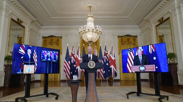 Tổng thống Joe Biden, Thủ tướng Úc Scott Morrison và Thủ tướng Anh Boris Johnson tại cuộc họp trực tuyến về sáng kiến ​​an ninh quốc gia mới của Hoa Kỳ hợp tác với Úc và Vương quốc Anh - Sputnik Việt Nam
