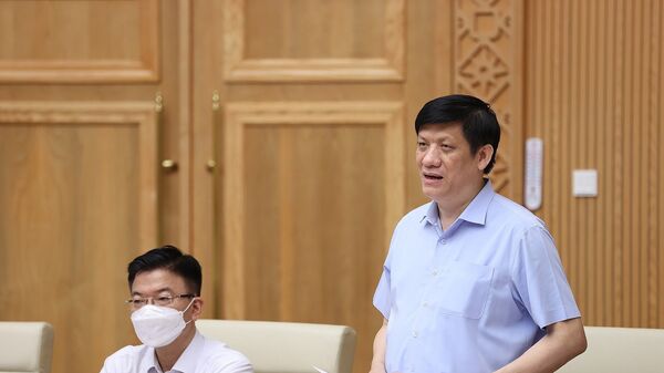 Bộ trưởng Bộ Y tế Nguyễn Thanh Long báo cáo công tác phòng, chống dịch COVID-19. - Sputnik Việt Nam