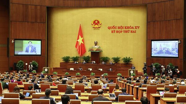 Thủ tướng Chính phủ Phạm Minh Chính trình bày Báo cáo kết quả thực hiện kế hoạch phát triển kinh tế - xã hội năm 2021; dự kiến kế hoạch phát triển kinh tế - xã hội năm 2022. - Sputnik Việt Nam
