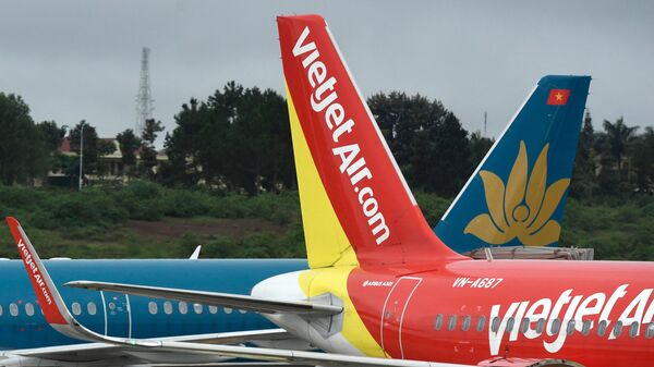 Máy bay của các hãng hàng không Việt Nam Vietjet và Vietnam Airlines - Sputnik Việt Nam