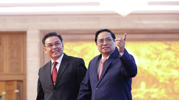 Thủ tướng Phạm Minh Chính và Chủ tịch Quốc hội Lào Saysomphone Phomvihane - Sputnik Việt Nam