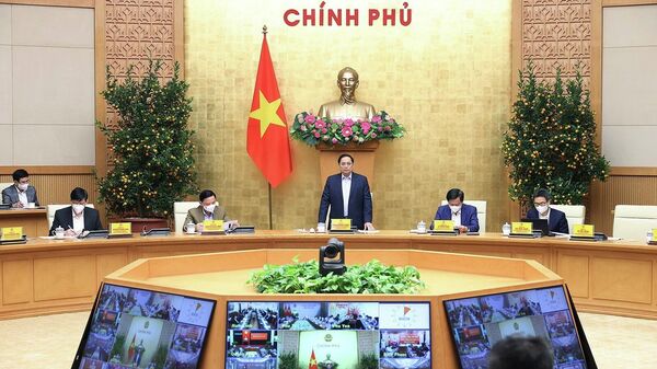 Thủ tướng Phạm Minh Chính chủ trì họp triển khai nhiệm vụ phòng, chống COVID-19 trong dịp Tết Nguyên đán - Sputnik Việt Nam