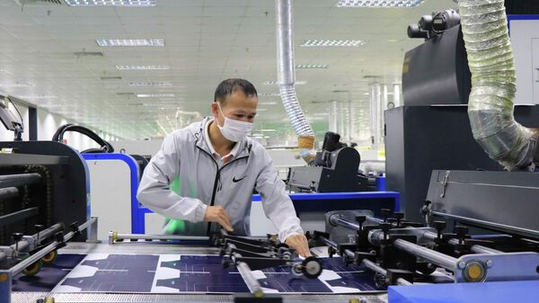 Công nhân lao động làm việc tại Công ty TNHH In bao bì YOTO Việt Nam (Bắc Ninh). - Sputnik Việt Nam