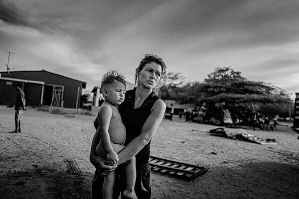 Tác phẩm từ loạt ảnh Người di cư Venezuela, Colombia của nhiếp ảnh gia Đan Mạch Jan Grarup, người chiến thắng trong hạng mục Nhiếp ảnh gia chuyên nghiệp / Dự án phim tài liệu, cuộc thi Sony World Photography Awards 2022 - Sputnik Việt Nam