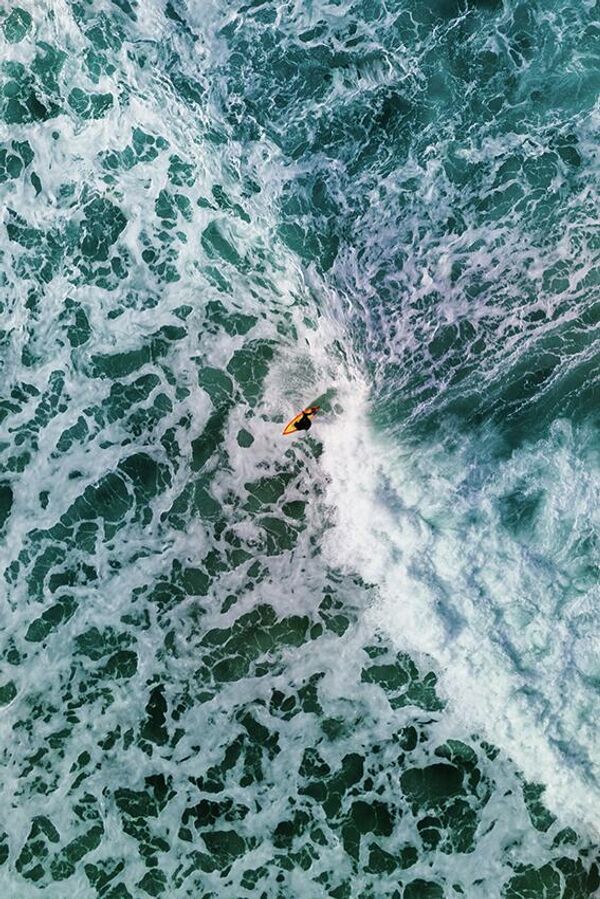 Bức ảnh “Thiên đường của một người lướt sóng” của nhiếp ảnh gia Úc Cameron Borg, người chiến thắng trong hạng mục Nhiếp ảnh gia trẻ / Văn hóa và Du lịch, cuộc thi Sony World Photography Awards 2022 - Sputnik Việt Nam