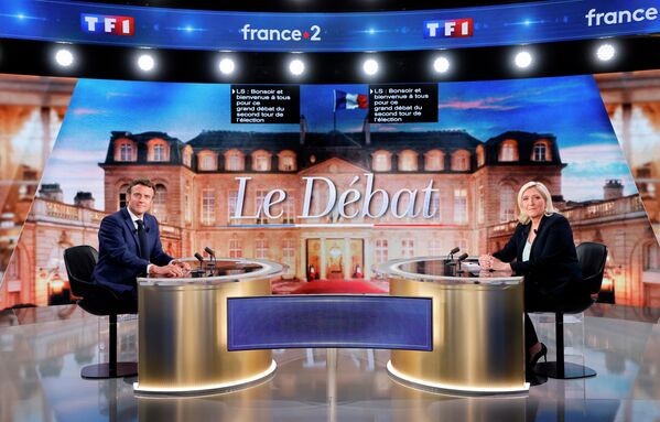 Tổng thống Pháp Emmanuel Macron và ứng cử viên tổng thống Marine Le Pen trước cuộc tranh luận trên truyền hình - Sputnik Việt Nam
