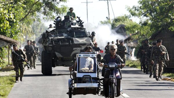 Những người lính tuần tra ở thành phố Datu Saudi Ampatuan, Philippines - Sputnik Việt Nam