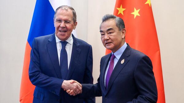 Ngoại trưởng Nga S. Lavrov và Ngoại trưởng Trung Quốc Vương Nghị - Sputnik Việt Nam