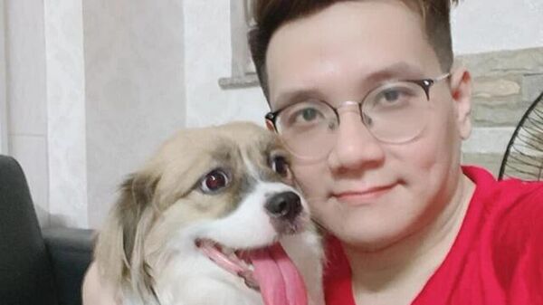 Hacker Việt Nhâm Hoàng Khang với một chú chó - Sputnik Việt Nam