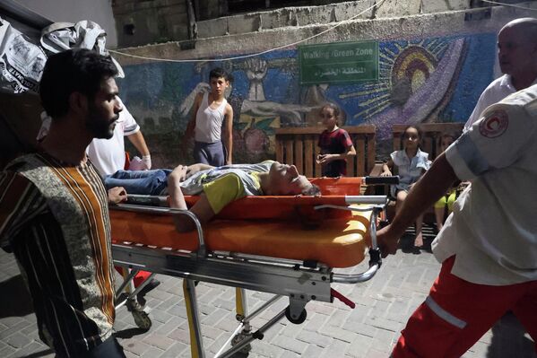 Nạn nhân sau cuộc tấn công của Israel vào Dải Gaza. - Sputnik Việt Nam