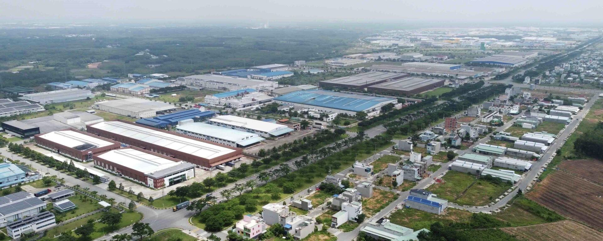 Một góc Khu công nghiệp Việt Nam - Singapore (VSIP) mở rộng ở thị xã Tân Uyên, tỉnh Bình Dương. - Sputnik Việt Nam, 1920, 01.12.2023