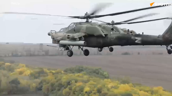 Bộ Quốc phòng Liên bang Nga cho thấy hoạt động chiến đấu của trực thăng Mi-28N tại Ukraina - Sputnik Việt Nam