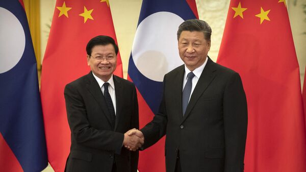 Tổng Bí thư Đảng Nhân dân Cách mạng Lào, Chủ tịch nước Cộng hòa Dân chủ Nhân dân Lào Thongloun Selulit đã thăm chính thức Trung Quốc - Sputnik Việt Nam