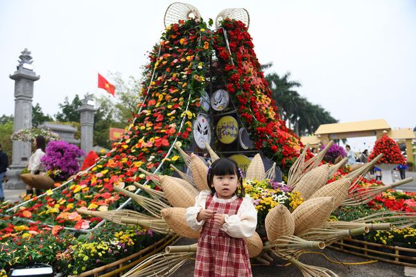Tại lễ hội hoa ở huyện Mê Linh, ngoại thành Hà Nội. - Sputnik Việt Nam