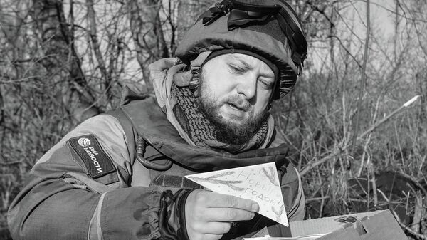 Phóng viên chiến trường RIA Novosti Rostislav Zhuravlev - Sputnik Việt Nam