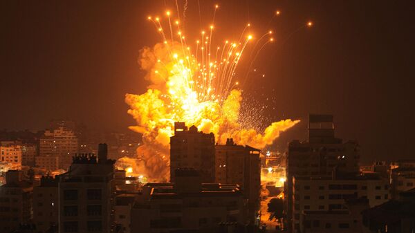 Обстрел зданий в палестинском городе Газа - Sputnik Việt Nam