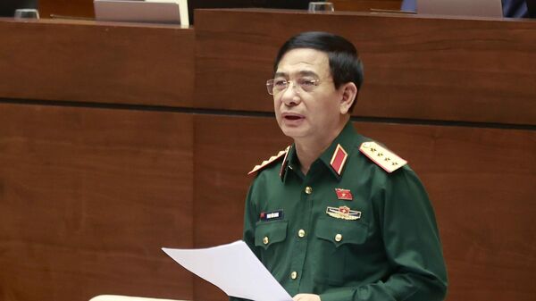 Bộ trưởng Bộ Quốc phòng Phan Văn Giang giải trình, làm rõ một số vấn đề đại biểu Quốc hội nêu. - Sputnik Việt Nam
