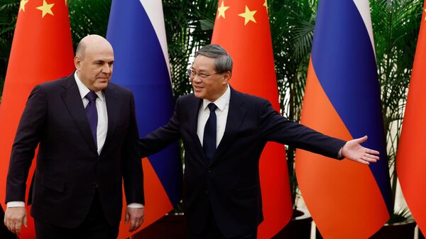 Thủ tướng Hội đồng Nhà nước Cộng hòa Nhân dân Trung Hoa Lý Cường trong cuộc gặp với Thủ tướng Nga Mikhail Mishustin - Sputnik Việt Nam