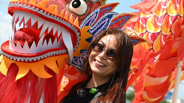 Cô gái ở lễ hội thuyền rồng - Sputnik Việt Nam