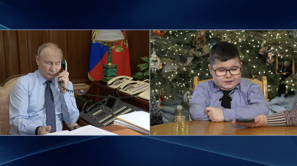 Ông gìa Noel Vladimir Putin thực hiện điều mơ ước của cậu bé 11 tuổi - Sputnik Việt Nam
