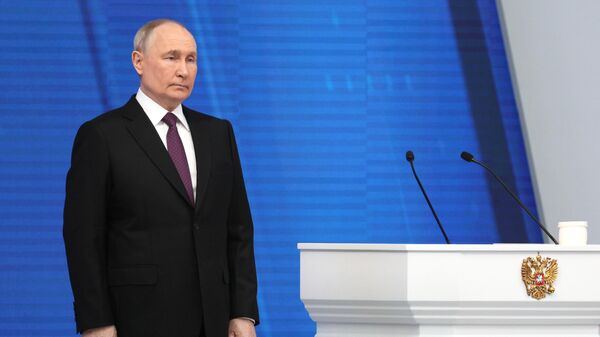 Ngày 29 tháng 2 năm 2024. Tổng thống Nga Vladimir Putin đang đọc bản Thông điệp gửi tới Quốc hội Liên bang. - Sputnik Việt Nam