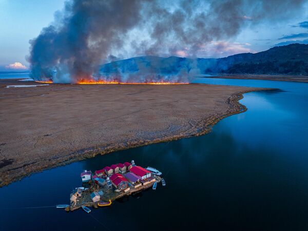 Ảnh “Between Calm and Catastrophe” (Giữa Bình yên và Thảm họa) của Yan Li (Trung Quốc), người chiến thắng ở hạng mục Travel (Du lịch) tại 2024 Sony World Photography Awards - Sputnik Việt Nam