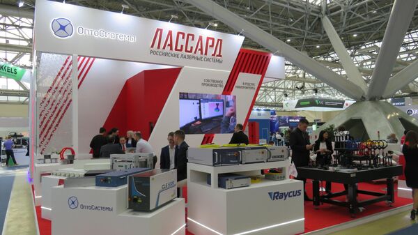 Gian hàng của công ty LASSARD. Russian Laser Systems (Matxcơva) chuyên phát triển và sản xuất thiết bị laser từ năm 2015. - Sputnik Việt Nam