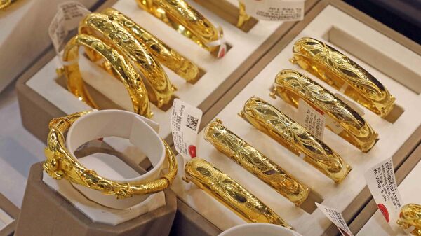 Vàng trang sức được bày bán tại một cửa hàng kinh doanh vàng Bảo Tín Minh Châu. - Sputnik Việt Nam
