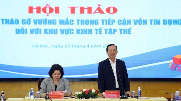 Phó Thống đốc Ngân hàng Nhà nước Việt Nam Đào Minh Tú phát biểu. - Sputnik Việt Nam