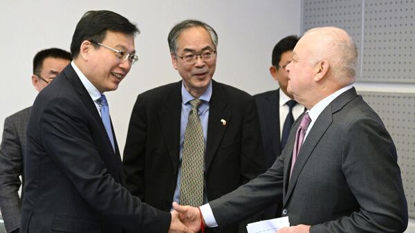 Rossiya Segodnya và Tân Hoa Xã ký thỏa thuận đăng cai Diễn đàn chuyên gia BRICS
