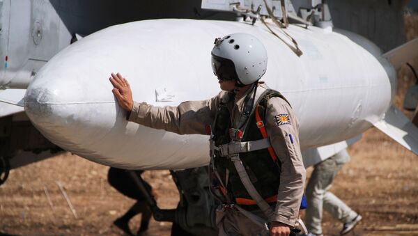 Phi công Nga trước giờ xuất kích tại căn cứ không quân Hmeymimở Syria - Sputnik Việt Nam