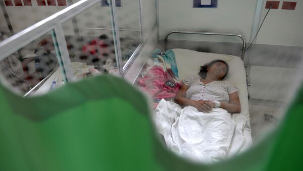 Người phụ nữ tại bệnh viện ở San Salvador - Sputnik Việt Nam
